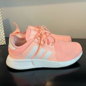 Bright pink adidas shoes